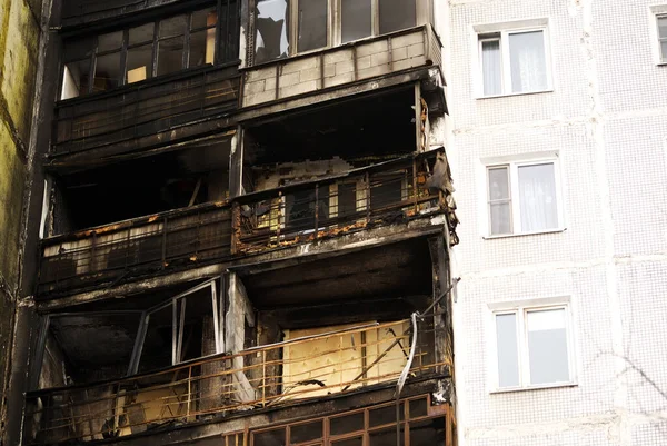 burnt walls of a tall house, moscow