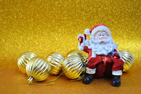 Christmas Decoration Santa Claus Golden Spheres Golden Background — Stock Photo, Image