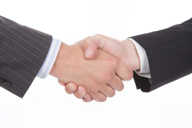 Closeup of a business handshake clipart