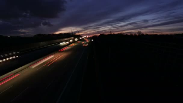 Autopista al atardecer - timelapse — Vídeos de Stock