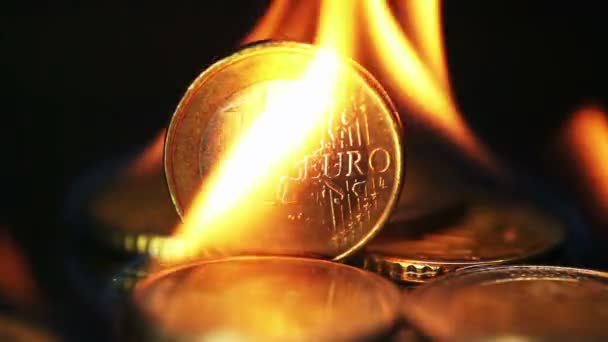 Euro coins caught on fire — Stock Video