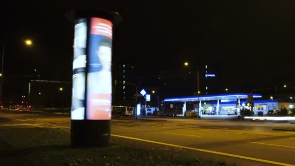 Spinning advertising pillar, ARAL gas station, time lapse — Stock Video