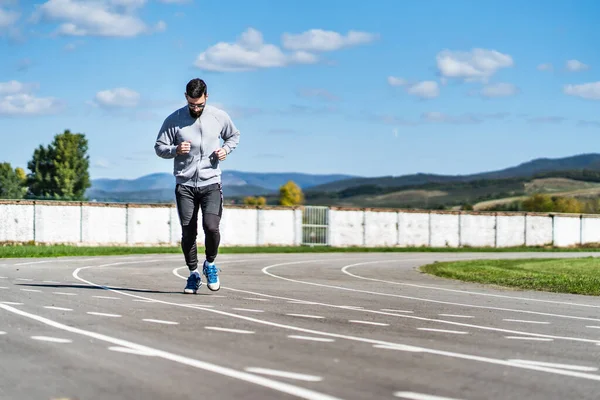 Full Length Front View Adult Caucasian Man Jogging Running Track — Stockfoto