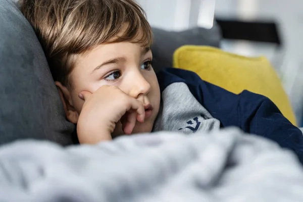Portrait Small Four Years Old Boy Sitting Sofa Bed Home — Stock Photo, Image
