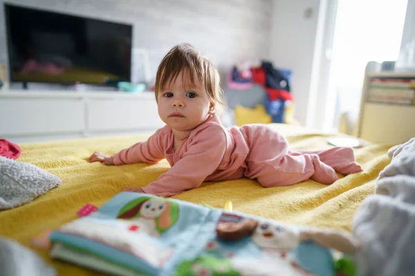 One Small Caucasian Baby Lying Alone Bed Home Looking Camera — Stock Photo, Image