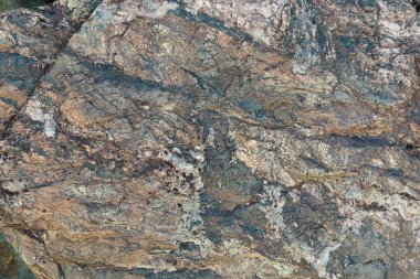 Grunde soyut taş arka planı. Taşın dokusu. Yakın plan..