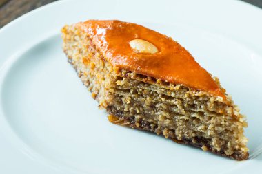 Baklava ya da baklava, ezilmiş fındık, şeker ve kakule ile doldurulmuş tereyağlı ve şuruplu bir puf kek şeklinde doğulu bir tatlılıktır.