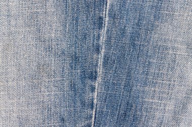 İndigo kot duvar kağıdı. Grunge kotları. Eski tuval yüzeyini kapatın. Kumaş makro arkaplan