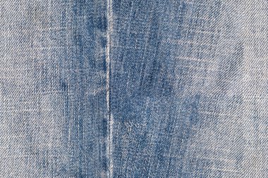 İndigo kotun dikişsiz dokusu. Kot pantolon arka planı. Kumaş duvar kağıdı. Kapalı eski grunge tuval yüzeyi. Makro arkaplan