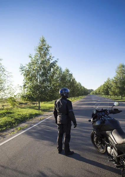 Motorcycle journey.Traveling on a motorcycle on the mountain road . — Stok Foto