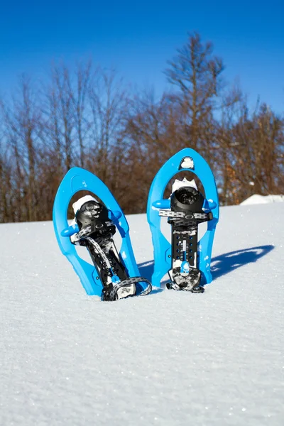Snowshoeing. Snowshoes in the snow. — Stock Photo, Image
