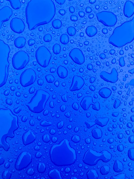 Wassertropfen Auf Blauem Kunststoff Hintergrundbild — Stockfoto
