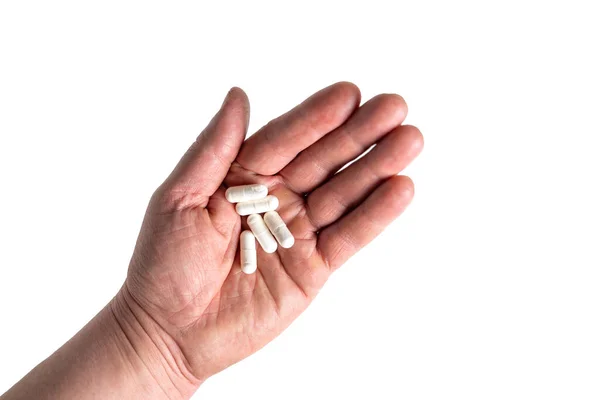 Verschillende Witte Pillen Hand Isoleren Wit — Stockfoto