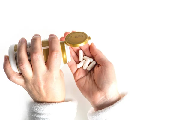 Tratamento Prevenção Doenças Uma Mulher Derrama Pílulas Brancas Tubo Com — Fotografia de Stock