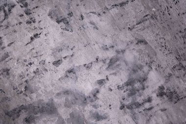 Siyah parıltılı arkaplan resmi olan gri beton duvar