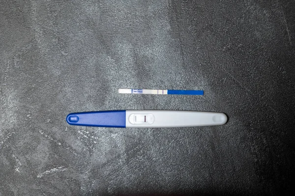 Positive Pregnancy Test Gray Surface — Stock Photo, Image