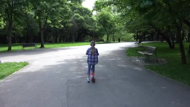 Kid Riding Scooter in Park, Child Playing Outdoor Doing Sport,  Girl Relaxing in Nature, Healthy Activity — 비디오