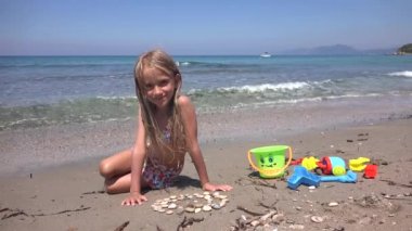 Kid Playing on Beach, Child Making Sand Castles, Child on Seashore, Girl in Greece in Summer Vacation