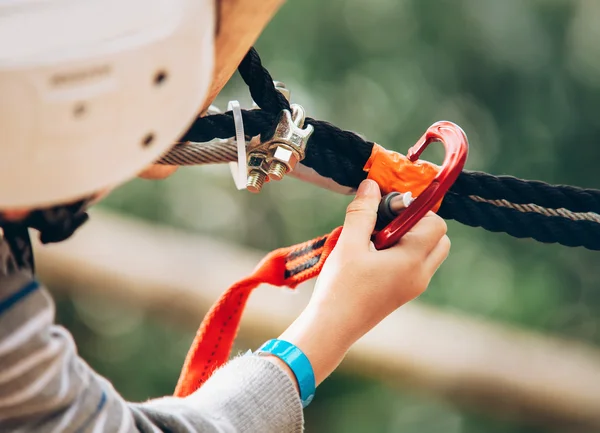 Child with safety spring hook — Stock Photo, Image