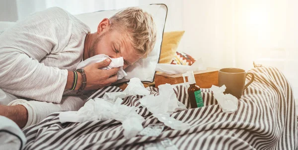 Unhealthy Tired Man Sneezing Wiping Snotty Nose Man Lying Cozy — Stock Photo, Image