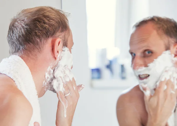 Man with shaving foam — Stock Photo, Image
