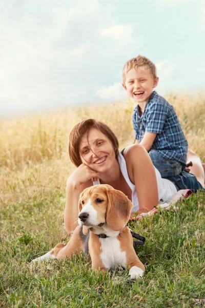 Family with dog  outdoor — Stock Photo, Image