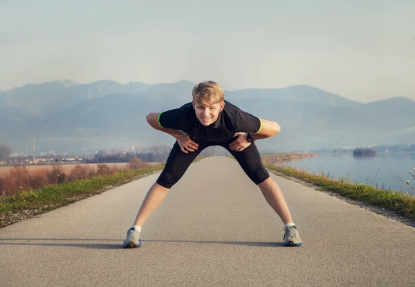 Man  Warming up before running — Stock Photo, Image