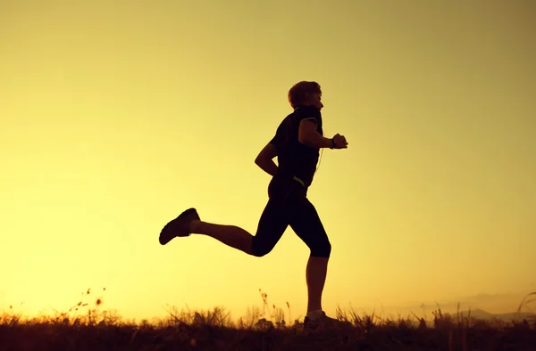 Running man silhouette — Stock Photo, Image