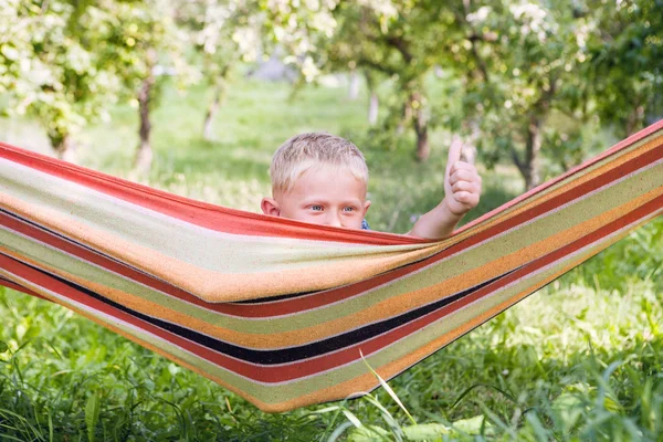 Happy little boy in hammock — Stock Photo, Image