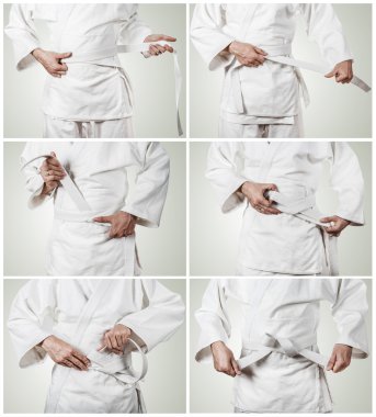 Karateka kemer adım adım bağlıyor.