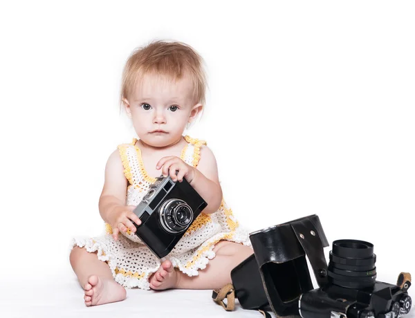 Baby girl with retro  camera — Φωτογραφία Αρχείου