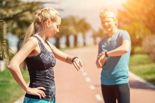 Runners checked results of run distance — Stock Photo, Image