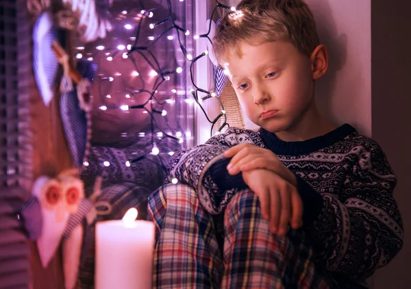 Sad boy waiting for Christmas — Stock Photo, Image