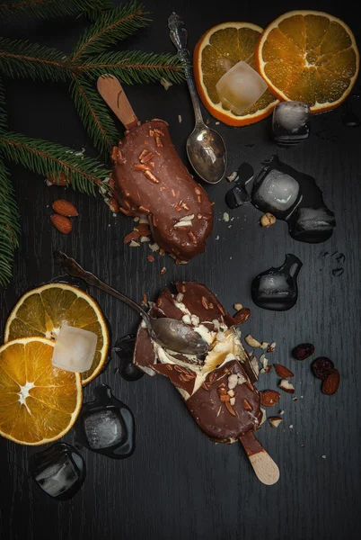 Ice cream in dark chocolate — Stock Photo, Image