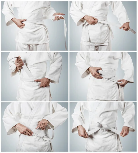 Cintura di karateka legando immagini — Foto Stock