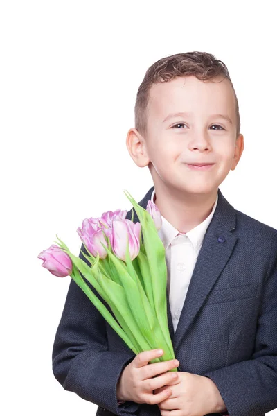 Pojke med blommor — Stockfoto