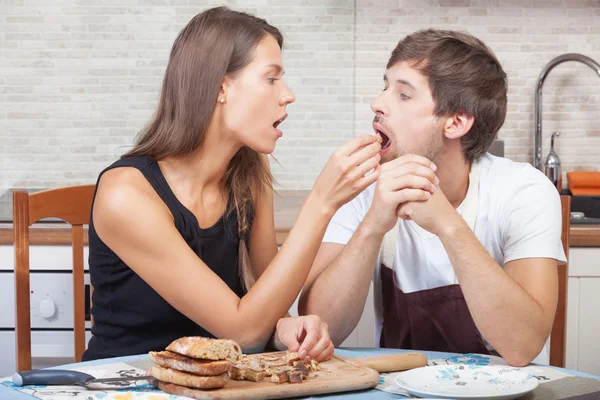 Couple at the kitchen — Stock Photo, Image