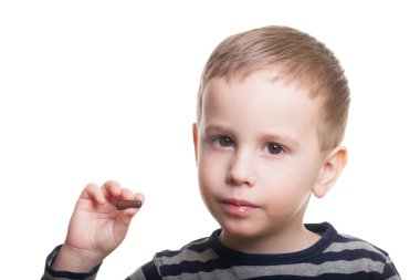 Boy with pill on isolated white clipart