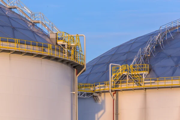 Modern oil storage tanks with Detail of steps and stairs Stock Picture