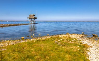 Coastline of Grevelingen brackish inlet in Zeeland Province, the Netherlands. clipart