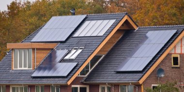 Solar panels on  house clipart
