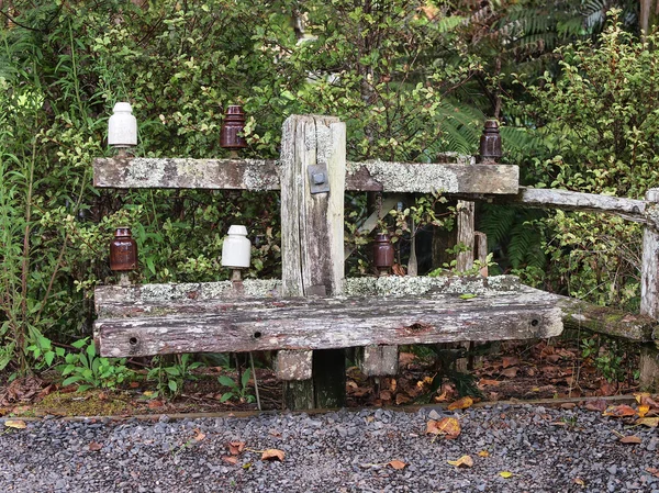 Wooden Seat made of a Telphone Pole — Stock Photo, Image