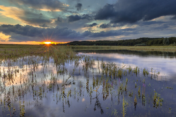 Dark river foreland landscape