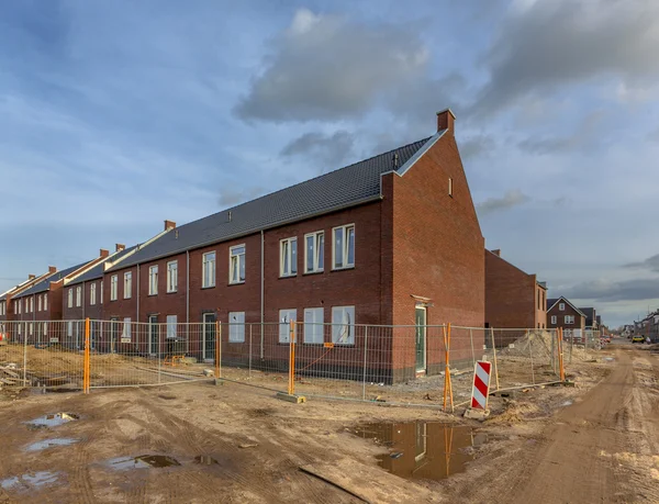 Brand new houses on a building site — Stock Photo, Image