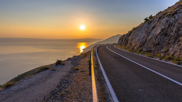 Road to orange sunset — Stock Photo, Image