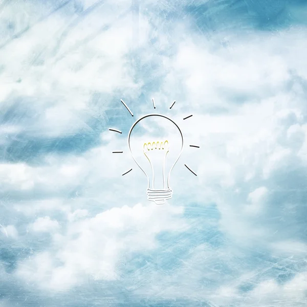 Conceptual cloudscape background with lightbulb sketch