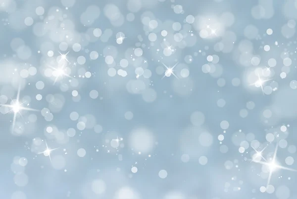 Winter blurred background with sparkle