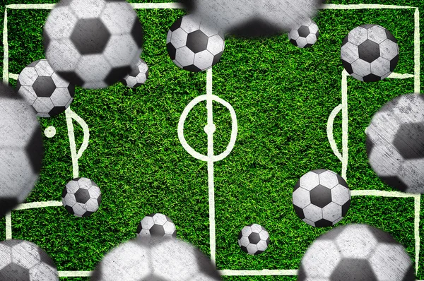 Soccer balls with football field background — Stok fotoğraf