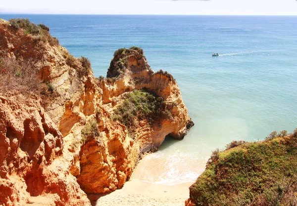 Rocky beach at sunset, Lagos, Portugal. — Stock Photo, Image