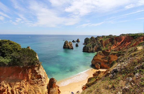 Rocky beach at sunset, Lagos, Portugal. — Stock Photo, Image